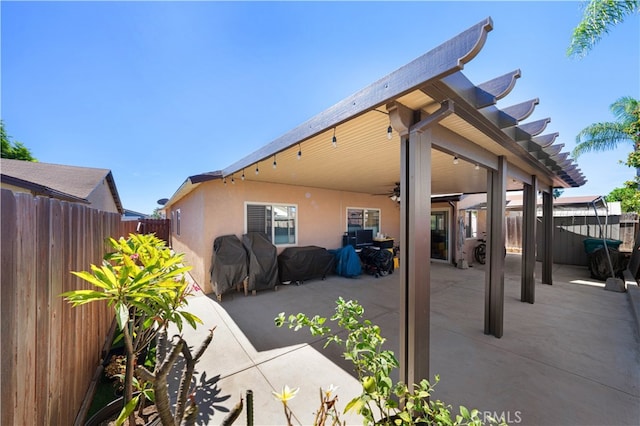 view of patio featuring a pergola