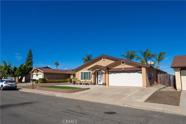 ranch-style home featuring a garage