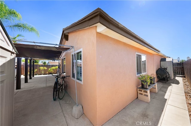 view of home's exterior with a patio