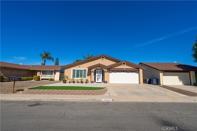 ranch-style house featuring a garage