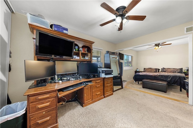 home office with carpet and ceiling fan