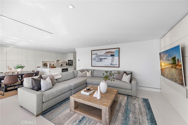 living room with light tile patterned floors