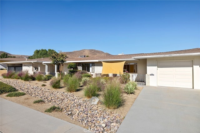 ranch-style home with a garage