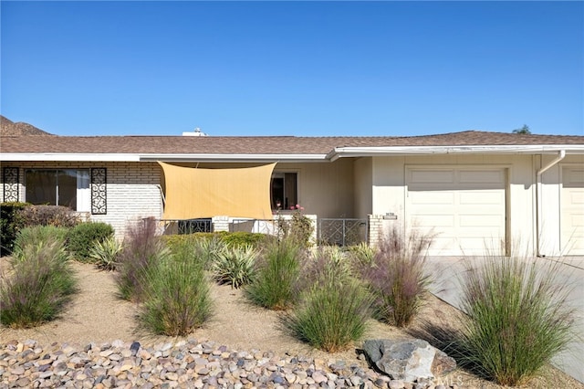 single story home with a garage