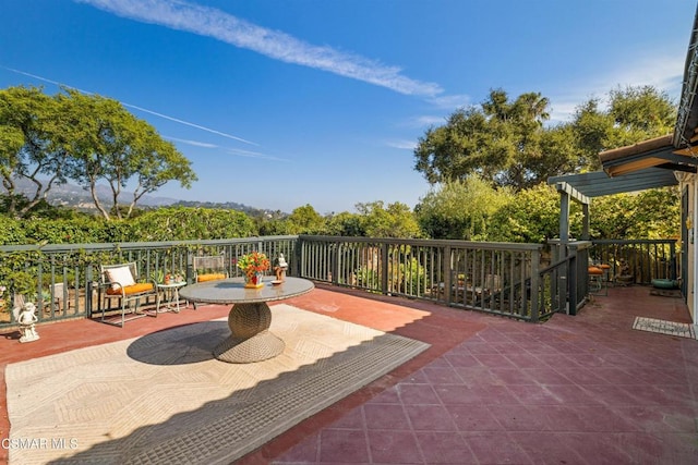 view of patio featuring a pergola