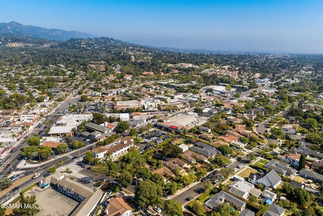 birds eye view of property featuring a mountain view