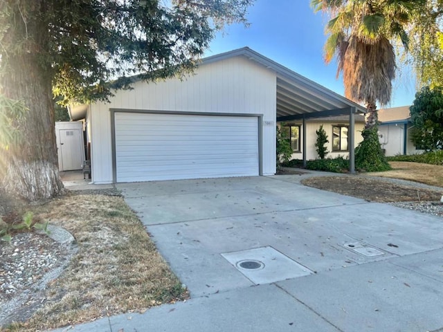 single story home with a garage