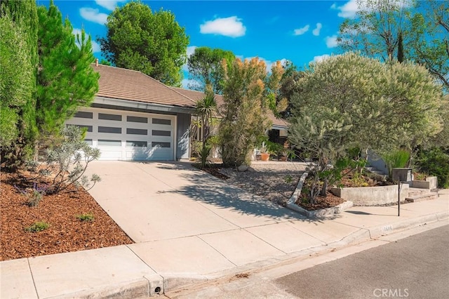 view of front of home with a garage