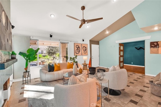 living room with ceiling fan and lofted ceiling