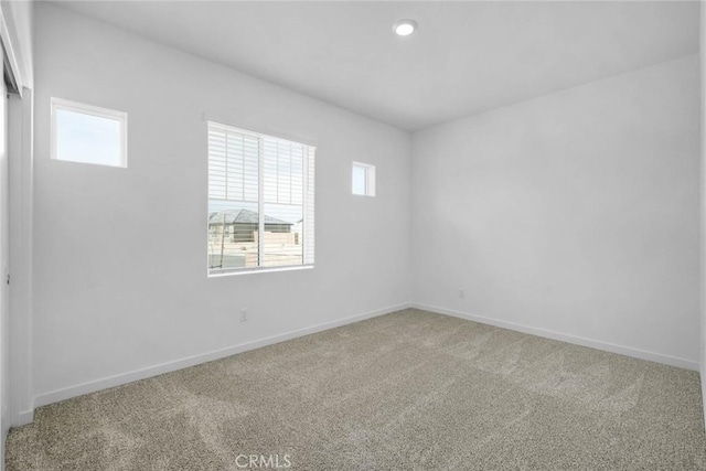 view of carpeted spare room