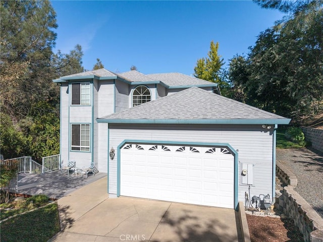 view of front of property featuring a garage