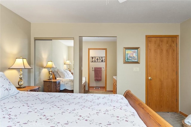 bedroom with carpet flooring and a closet