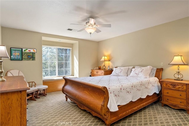 bedroom featuring ceiling fan and carpet floors