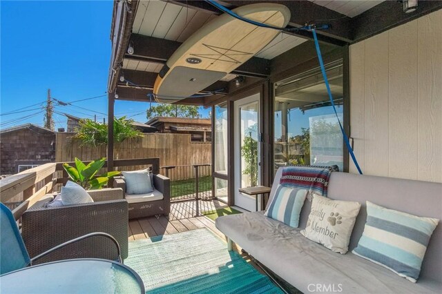 deck featuring an outdoor living space