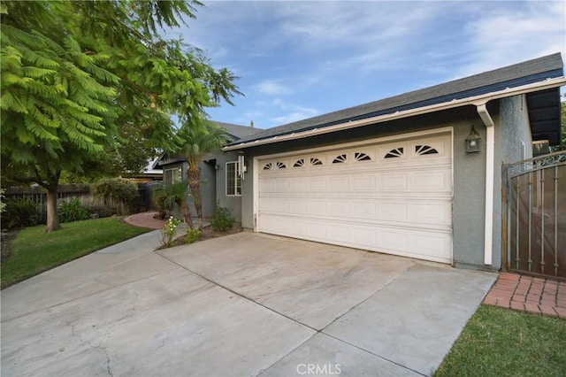 ranch-style house with a front lawn and a garage