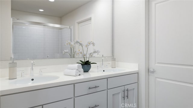 bathroom with vanity and an enclosed shower