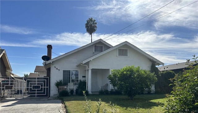 view of front of home with a front yard