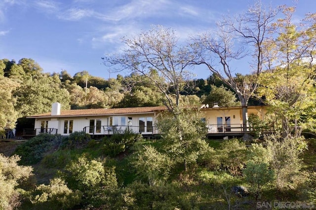 back of property with french doors