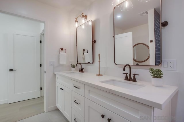 bathroom featuring vanity