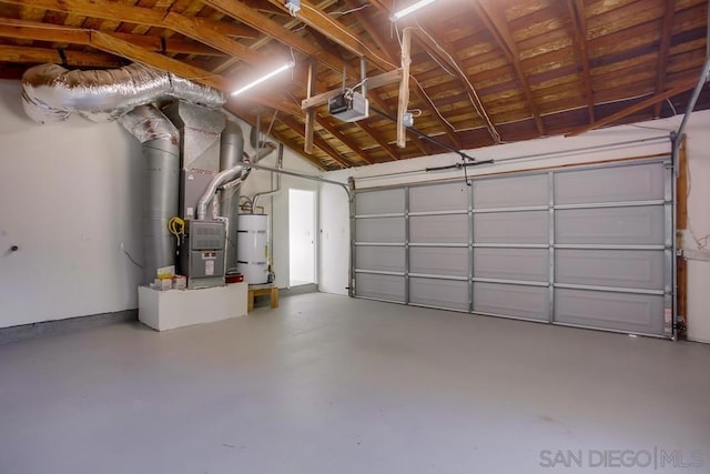 garage with secured water heater and a garage door opener