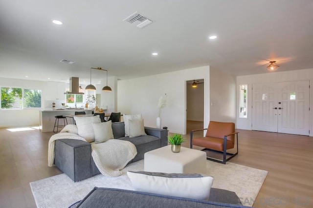 living room featuring light hardwood / wood-style flooring