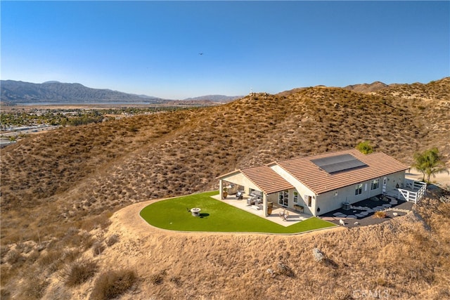 bird's eye view with a mountain view