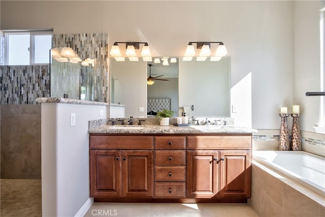 bathroom featuring vanity, separate shower and tub, tile patterned flooring, and ceiling fan