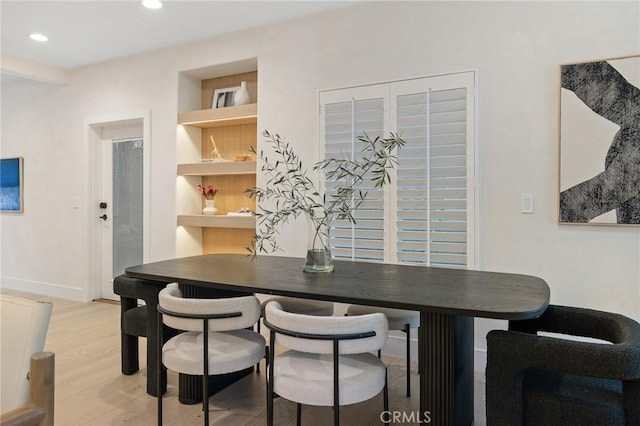 dining space featuring hardwood / wood-style floors