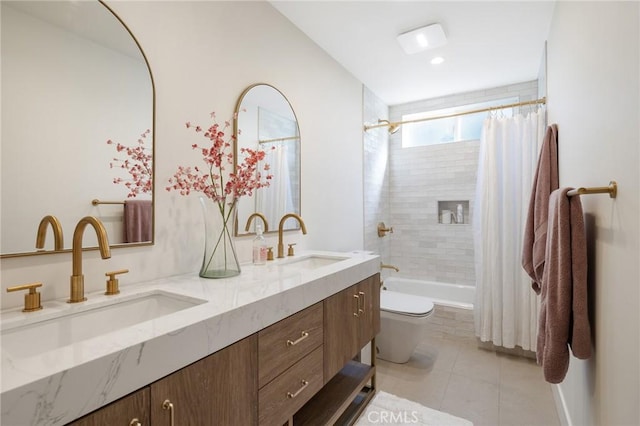 full bathroom with vanity, shower / tub combo, tile patterned floors, and toilet