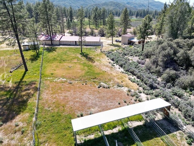 aerial view featuring a rural view and a mountain view