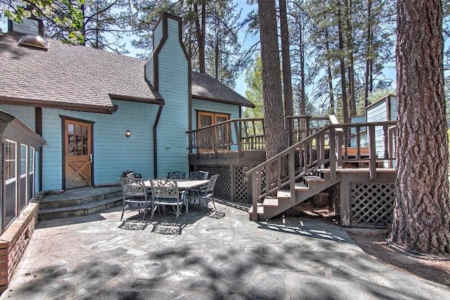 view of patio / terrace featuring a wooden deck