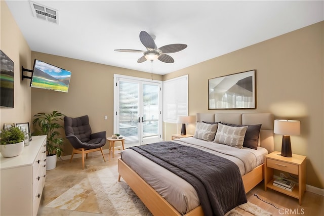 bedroom featuring ceiling fan, access to exterior, and french doors