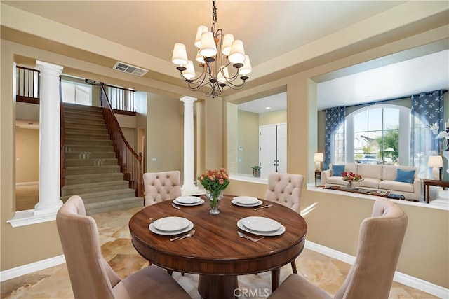 dining space featuring an inviting chandelier