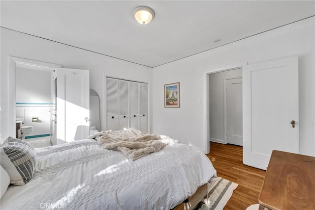 bedroom with light hardwood / wood-style floors