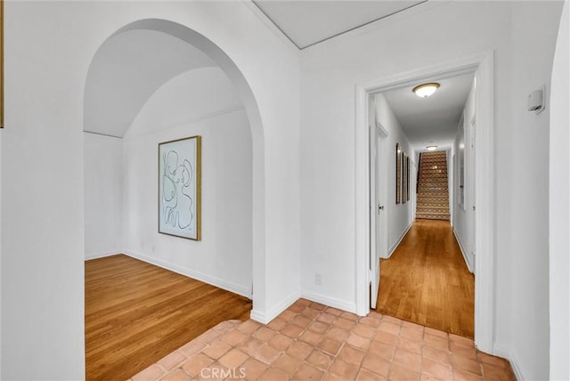 hall featuring light tile patterned floors