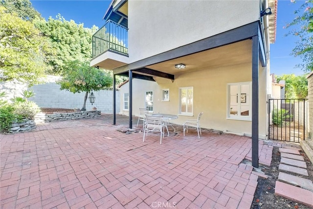 view of patio / terrace featuring a balcony