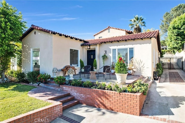 rear view of property with a patio