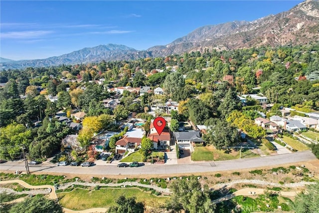 birds eye view of property featuring a mountain view