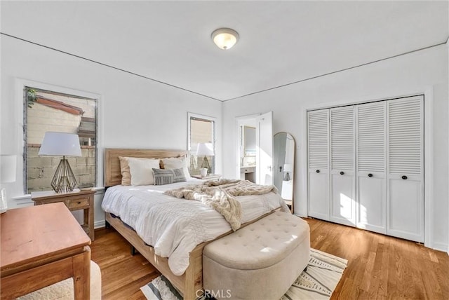 bedroom featuring light wood-type flooring