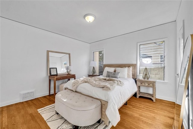 bedroom with light hardwood / wood-style flooring