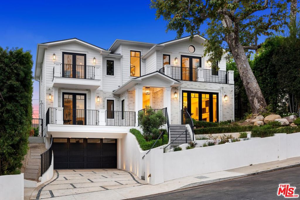 view of front of home featuring a garage and french doors