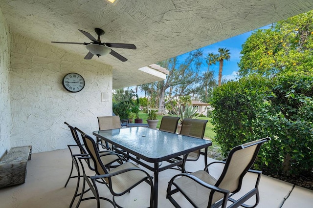 view of patio / terrace featuring ceiling fan