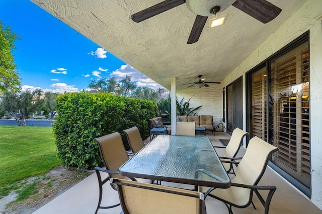 view of patio featuring ceiling fan