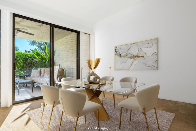 dining space with ceiling fan