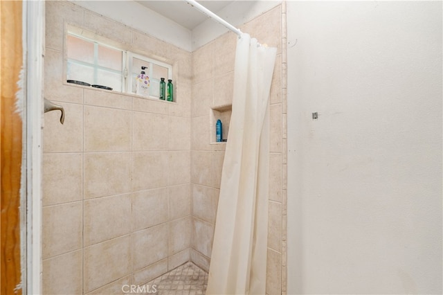 bathroom featuring curtained shower