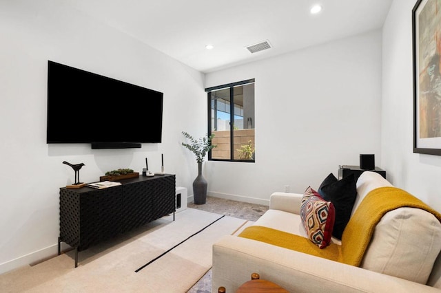 living room with light colored carpet