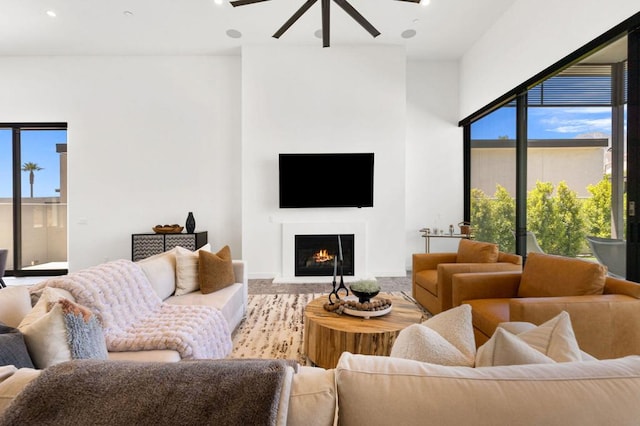 living room featuring ceiling fan