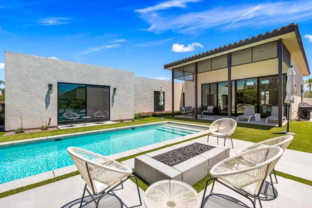 view of pool featuring a patio area