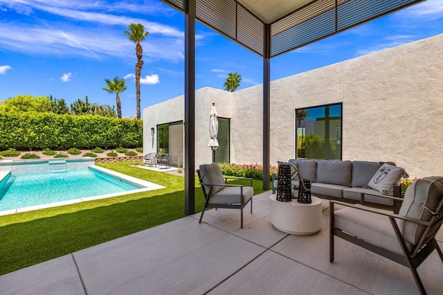 view of pool featuring a patio area, a lawn, and an outdoor hangout area