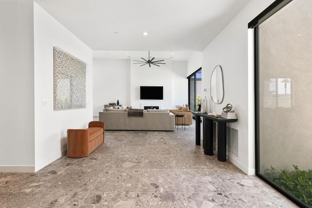 living room featuring ceiling fan